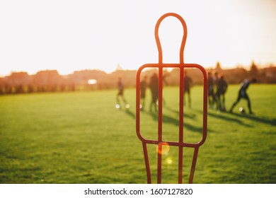 Football Free Kick Training Dummy. Sports Training Background. Soccer Team On Training Practice Session On Sunny Day. Football Players Running On Grass Field In The Blurred Background