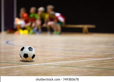 Football Futsal Ball And Youth Team. Indoor Soccer Sports Hall. Children Indoor Soccer Team. Sport Futsal Background. Indoor Soccer Winter League For Kids