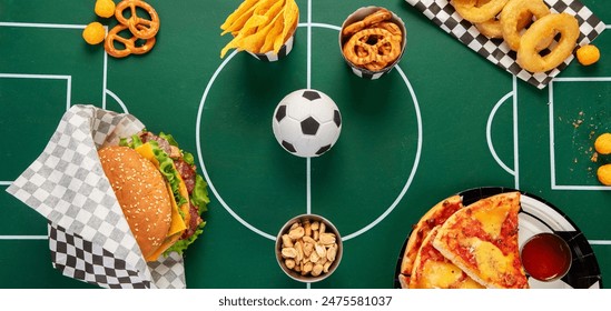 Football game watch party food and snacks on a football field. Football party. Top view. Panorama. - Powered by Shutterstock