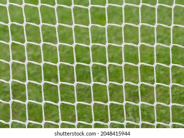 Football Goal Net Texture On Grass Background