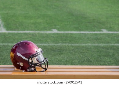 Football Helmet On A Bench