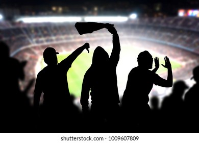 Football Hooligans In Game. Angry Soccer Fans Shouting And Booing In The Crowd. Losing Team Fans Got Mad. Furious Silhouette People Complain And Protest A Mistake Made By Referee.