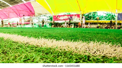 A Football Kickoff Match At The Indoor Soccer Field.