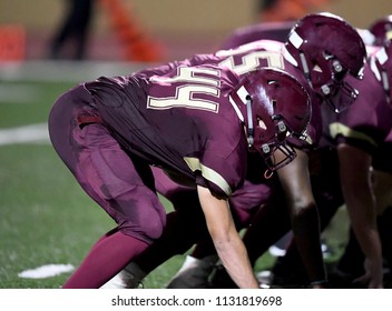 Football Linemen Rushing, Blocking And Tackling