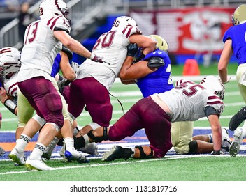 Football Linemen Rushing, Blocking And Tackling