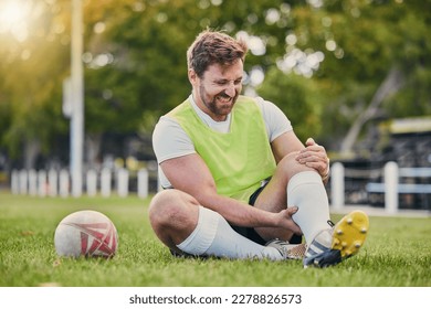 Football, man and knee pain on grass field, inflammation and bruise with training, workout and exercise. Male player, athlete or guy on ground, leg injury and health issue with practice and emergency - Powered by Shutterstock