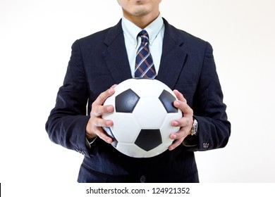 Football Manager Hold Ball With His Hands In Studio