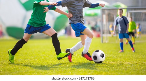 Young Soccer Players Running After Ball Stock Photo 576650974 ...