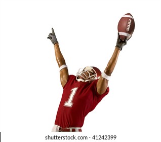 Football player celebrates wining touchdown