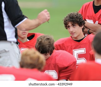 Football Player In Huddle