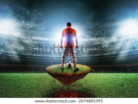 Football player on a fiery field ready to kick the ball