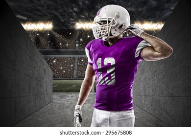 Football Player With A Pink Uniform On A Stadium Tunnel.