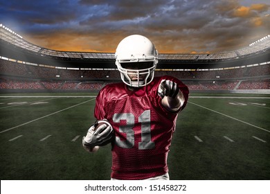 Football Player with a Red uniform celebrating with the fans. - Powered by Shutterstock