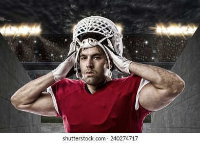 Football Player With A Red Uniform On A Stadium Tunnel.