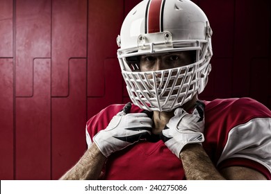 Football Player with a red uniform on a Locker room. - Powered by Shutterstock