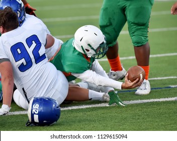 Football Player Running And Diving For A Touchdown