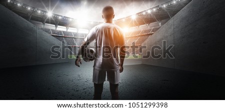 Football player in the stadium