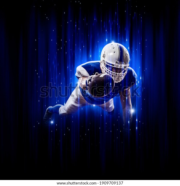 Football Player player\
with a superhero pose  wearing a blue uniform on a black background\
with blue lights.