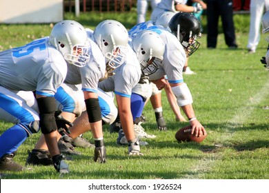 football players, offense â€“ defense in action