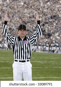 Football Referee Signaling Touchdown