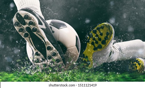 Football scene at night match with close up of a soccer shoe hitting the ball with power - Powered by Shutterstock