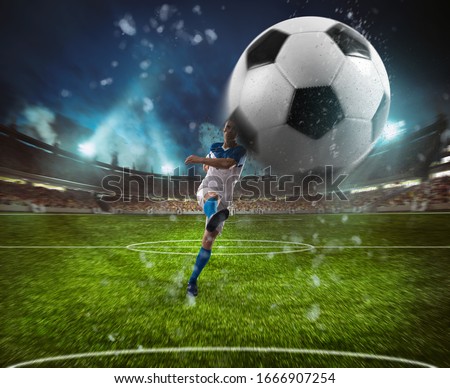 Football scene at night match with player in a white and blue uniform kicking the ball with power