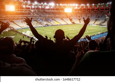 Football, Soccer Fan Support Their Team And Celebrate Goal, Score, Victory. Black Silhouette