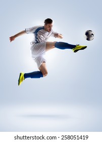 Football Soccer Player In Action  Isolated On Color Background