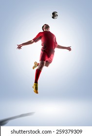 Football Soccer Player In Action  Isolated On Color Background