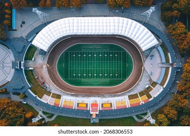 Football Stadium With Bright Green Grass And White Line Markings. American Football. View From Above