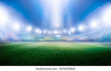 Football stadium with green grass with bokeh effect and spotlights - Powered by Shutterstock