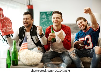 Football Supporters Cheering At Home  
