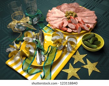 Football Team Colors Party Table Setting In Dark Green, Gold And White Theme, With Party Food.