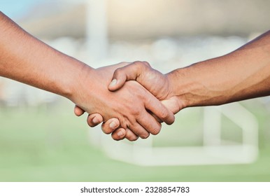 Football, team handshake and partnership at stadium for sports deal, support or agreement. Collaboration, shaking hands and soccer players welcome to game, competition and workout for exercise match. - Powered by Shutterstock