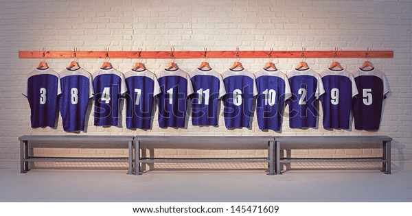 Football Team\
Shirts on locker room wall with\
bench