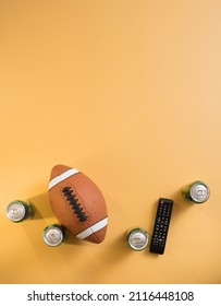 Football Watch Party Background With Soda Cans And Remote