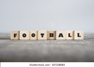 FOOTBALL word made with building blocks - Shutterstock ID 547238083