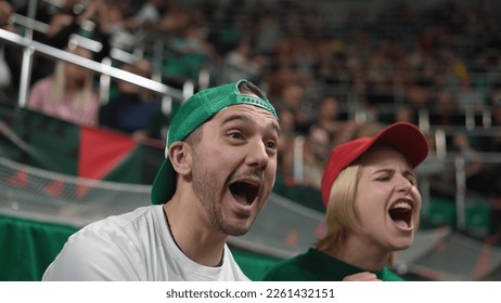 Footballs sport fans tribune arena. Guy won cup. Crazy girl enjoy soccer event. People joy win goal score. Couple clap date. Happy man view football play. Soccer stadium club. Pair watch victory field - Shutterstock ID 2261432151