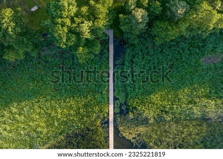 Footbridge over the lake in western Poland seen from above