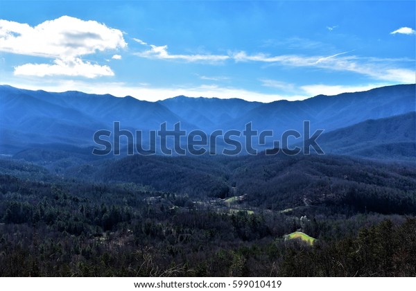 From the Foothills Parkway looking south to\
the Tennessee / North Carolina state line divide, view the\
beautiful high ridges and valleys of the Northeast Great Smoky\
Mountains in Tennessee.