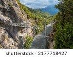 Footpath of the metal footbridge in the mountain in the town of Panticosa in the Pyrenees, Huesca