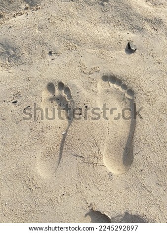 Footprint of newly married couple which is a sign of Love and spirit to live together for whole life.