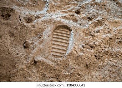 Footprint on the Moon surface - Shutterstock ID 1384330841