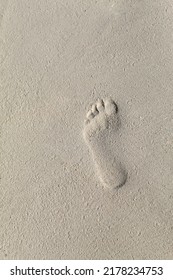 footprint in the sand on the beach - Shutterstock ID 2178234753