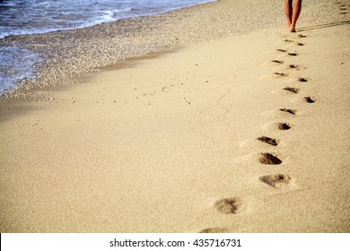 Footprint in sand on the beach
