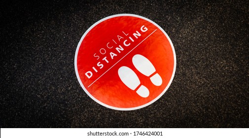 Footprint Sign For Stand In The Mall.Social Distance Word Sticker Poster.Social Distancing 6 Ft. Instruction Against The Spread.New Normal Reopen Mall.Social Distancing In The Workplace During Covid19