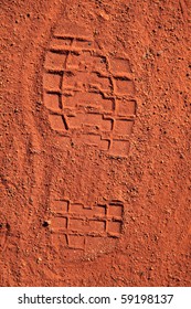 Footprint In The Typical Red Sand Desert Of Central Australia