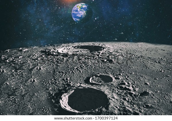 Footprints as an evidence of people\
being there or great forgery.The Earth as Seen from the Surface of\
the Moon - Elements of this Image Furnished by\
NASA