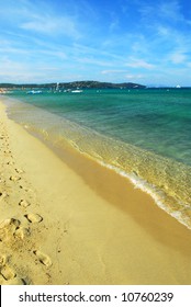 Footprints On The Golden Sand Of Famous Pampelonne Beach Near St. Tropez In French Riviera