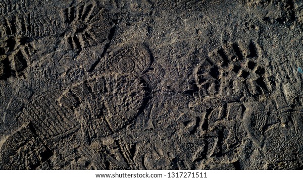 footprints on the\
ground